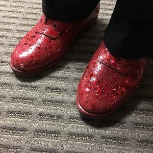 Feet wearing ruby slippers